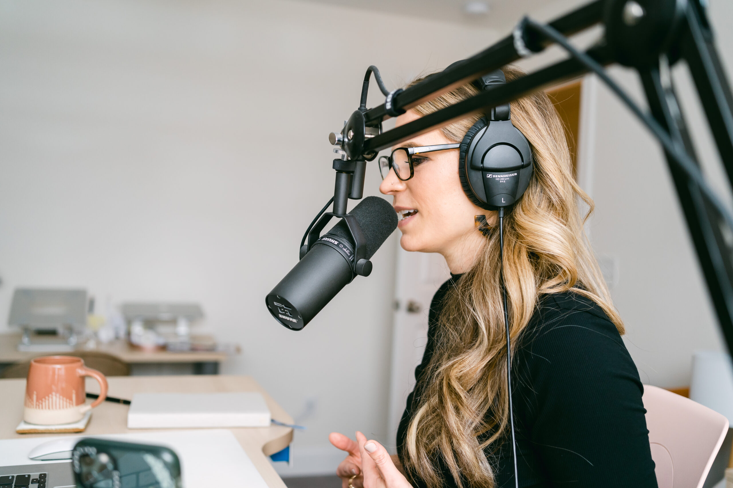 Laura Schoenfeld recording a private podcast